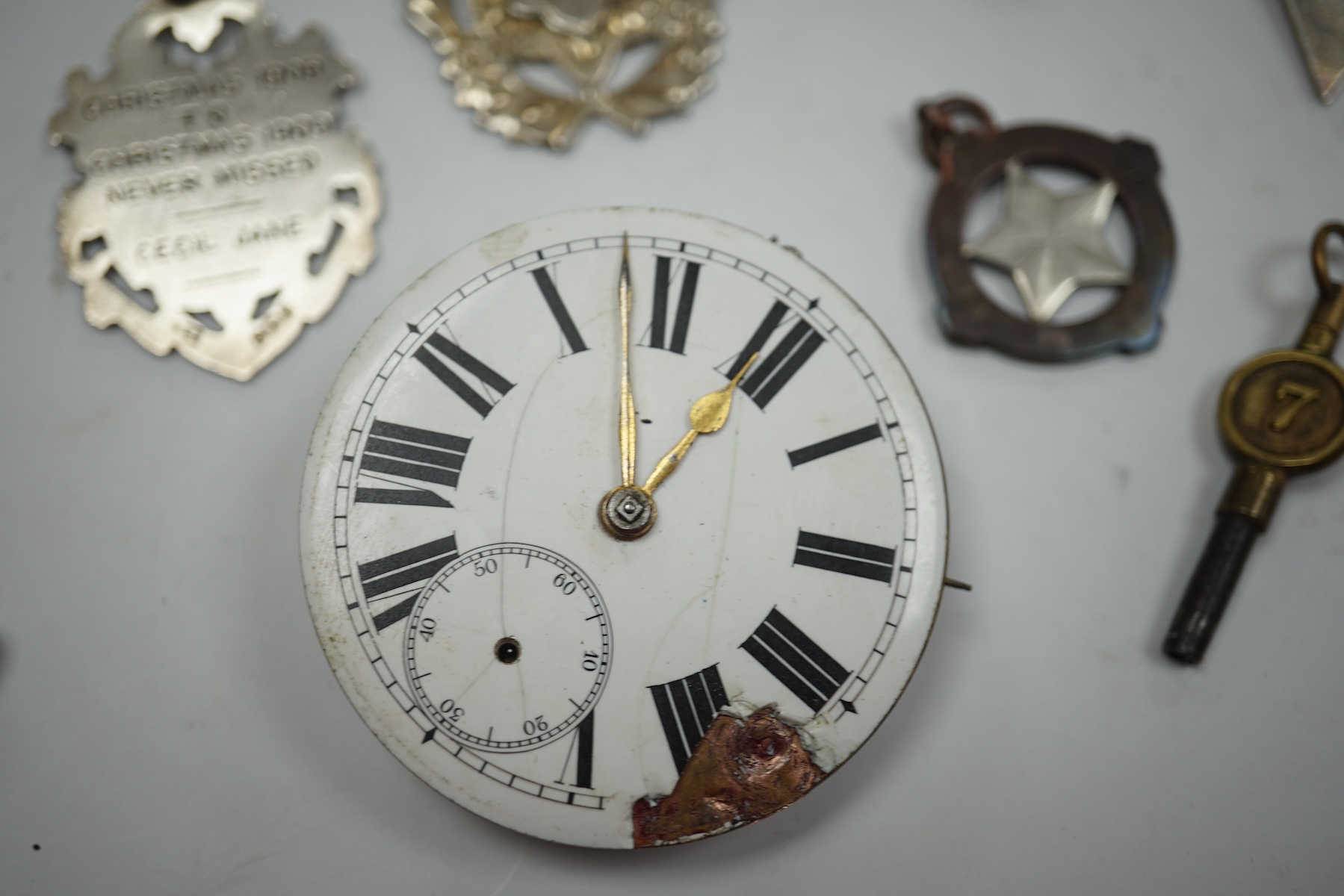 A gentleman's stainless steel Omega Seamaster manual with wrist watch, case diameter 35mm, on associated bracelet, together with three assorted pocket watches, a Girard Perregaux wrist watch movement and assorted silver